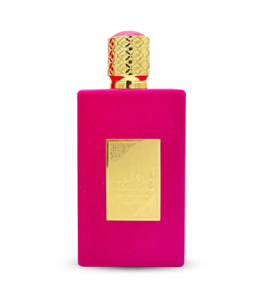 Vibrante fuchsia rechthoekige parfumfles ameerat al arab sugar crown edp met gouden label en gouden dop met roze edelsteen