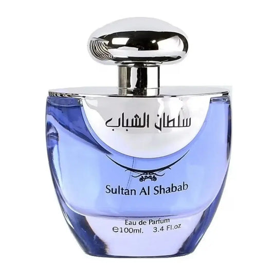 Een strak, transparant blauw glazen flesje sultan al shabab eau de parfum met een glanzende zilveren dop en etiket
