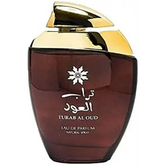 Een slanke donkere amberkleurige glazen fles met een gepolijste gouden dop en gegraveerd arabisch opschrift turab al oud van ard al zaafaran