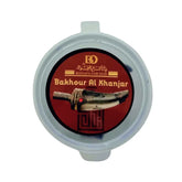 Bakhoor Al Khanjar in ronde container met mes-illustratie, onderdeel van verschillende soorten