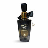 Zwarte glazen parfumfles met gouden accenten en zwarte strik bint hoorea eau de parfum al fakhr