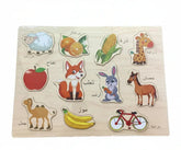 Educatieve houten puzzel met kleurrijke arabische dieren en fruitvormen zoals schaap, sinaasappel en giraffe