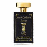 Zwarte leren flacon parfum met gouden folie etiket en glanzende gouden dop van ameer al oud khususi aswad met drumillustratie
