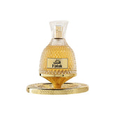 Gouden facetten glazen parfumfles met goudkleurige dop en basis met het etiket falak voor falak 100 ml