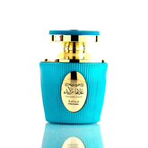 Turquoise parfumflesje met gouden dop en ribbels voor Ghala Zayed Fakhama