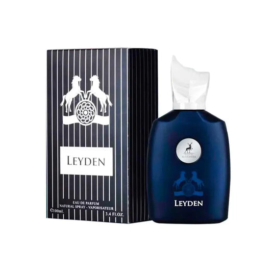 Diepblauwe glazen fles leyden eau de parfum met witte dop en zilveren embleem naast gestreepte zwart-witte doos al hambra parfum leyden