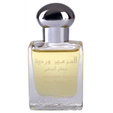 Een slanke transparante glazen fles met een gepolijst zilveren dop bevat de lichtgele Al Haramain parfumolie Wardia
