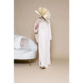 Beige modest dress with gold embellishments from the Kaftan Inaya Binti collection