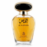 Een slanke transparante glazen fles al kanass eau de parfum met gouden dop en zwarte ovale top met amberkleurige geur