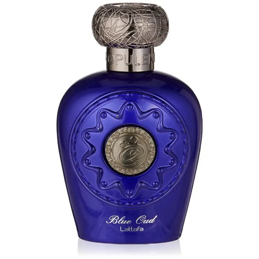 Diepblauwe glazen parfumfles lattafa parfum blue oud met zilverkleurige fijn geweven dop en goudkleurige medaille