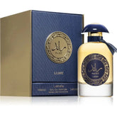 Lattafa parfum raed gold luxe luxe parfumfles in marineblauw met gouden accenten en een glanzende donkerblauwe dop gevuld met gouden vloeistof