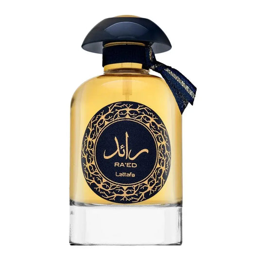 Een luxe amberkleurige parfumfles lattafa parfum raed gold luxe met glazen body, zwarte dop en marineblauwe strik