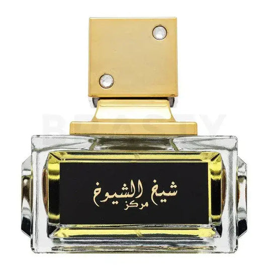 Een luxueuze transparante glazen parfumfles met gouden accenten en een sierlijke gouden dop met kristallen van Lattafa Parfum Sheikh al Shuyukh Concentrated