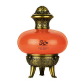 Oranje parfumfles met goudaccenten van Lattafa Pride Durrah voor elegante geurervaring