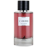 Roze geurflacon van Maison Alhambra L’Oudh met zwarte dop