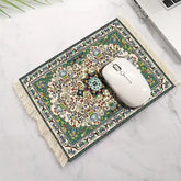 Muismat met perzisch tapijtdesign in groen en crème met franjeranden en intrigerende bloemen- en geometrische patronen