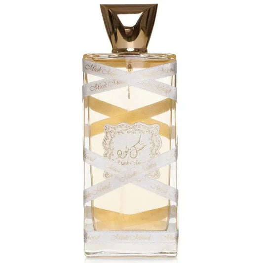 Een rechthoekige glazen parfumfles oud mood musk met een gouden driehoekige dop, witte linten en een zilveren etiket