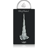 Zilverkleurige metalen replica van de burj khalifa op een zwarte doos labeled art of arabia i van lattafa pride product pride of arabia