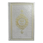 Quran kerim met nederlandse vertaling lichtgrijs met zilver en goudrijke gebonden kaft en gegraveerde bloemmotieven