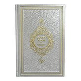 Quran kerim met nederlandse vertaling lichtgrijs met zilver en goudrijke gebonden kaft en gegraveerde bloemmotieven