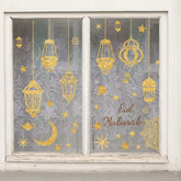 Golden glittery raamstickers met lantarens en sterren en eid mubarak tekst voor feestelijke eid en ramadan decoratie