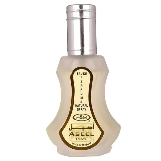 Een slanke, doorschijnende off-white glazen fles met zilverkleurige dop en gouden rand label eau de parfume natural spray van al-rehab