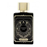 Zwart rechthoekig parfumflesje met gouden dop en zilveren filigraan ontwerp labeled goodness oud door azzedine