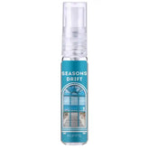 Een heldere glazen sprayfles met een teal label en raamontwerp, seasons drift edp 100 ml van riiffs