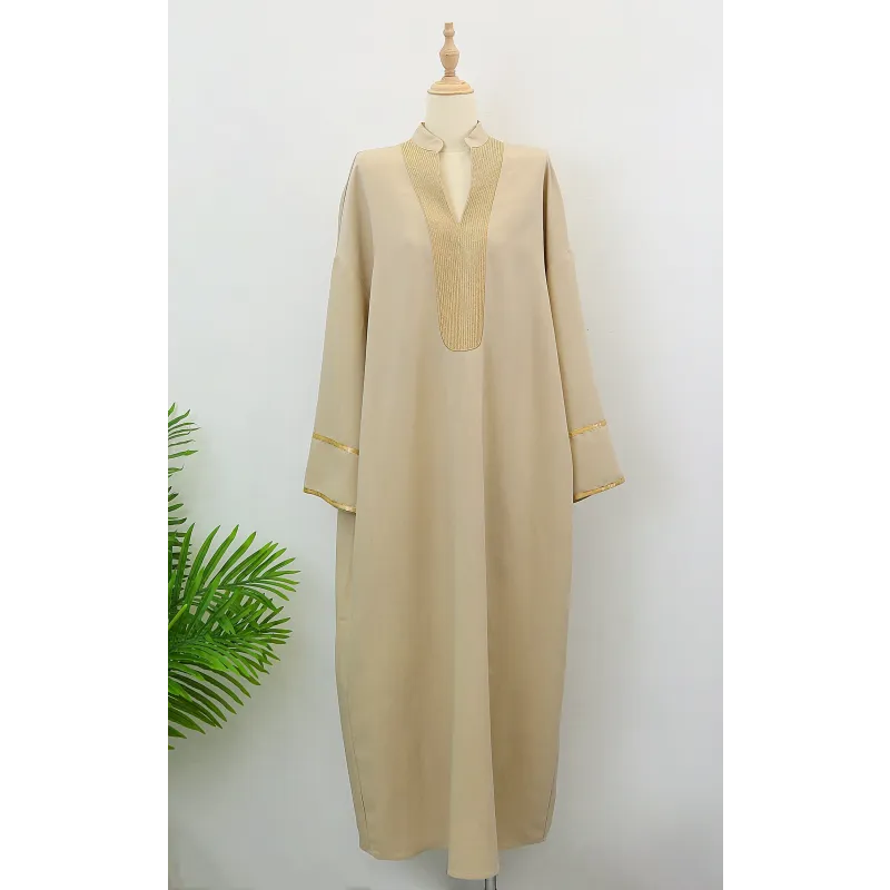 Beige abaya kaftan Salwa met gouden rand en zakdetails