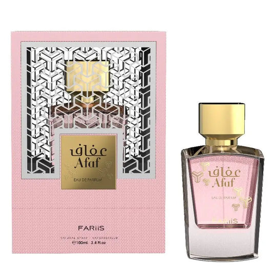 Een roze glazen parfumfles afaf edp 100ml met gouden dop en arabische gouden letters naast bijpassende roze doos