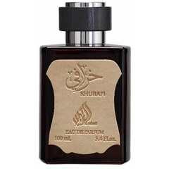 Donkere glazen parfumfles met beige/gouden label en Arabische tekst van Raheeb Parfum