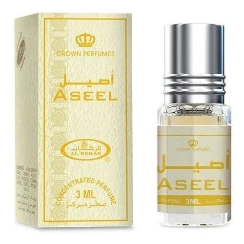 Fles met Crown Perfumes Aseel parfumolie en verpakking, bloemige parfum geurfamilie