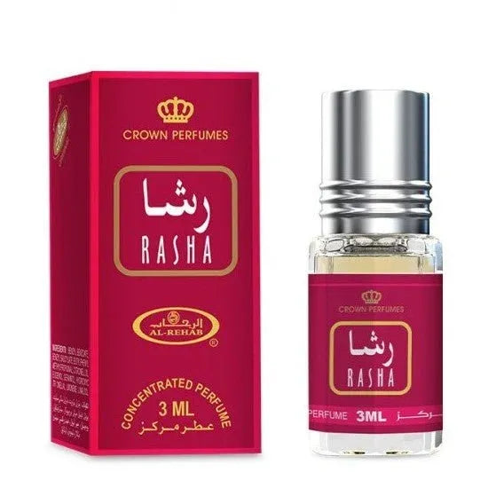 Roze en gouden parfumfles en doos van Al-Rehab Parfumolie Rasha, bloemige parfum