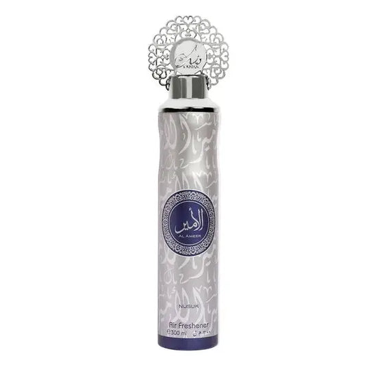 Silver and white ornate al ameer luchtverfrisser spray with decorative metal cap and arabic script label