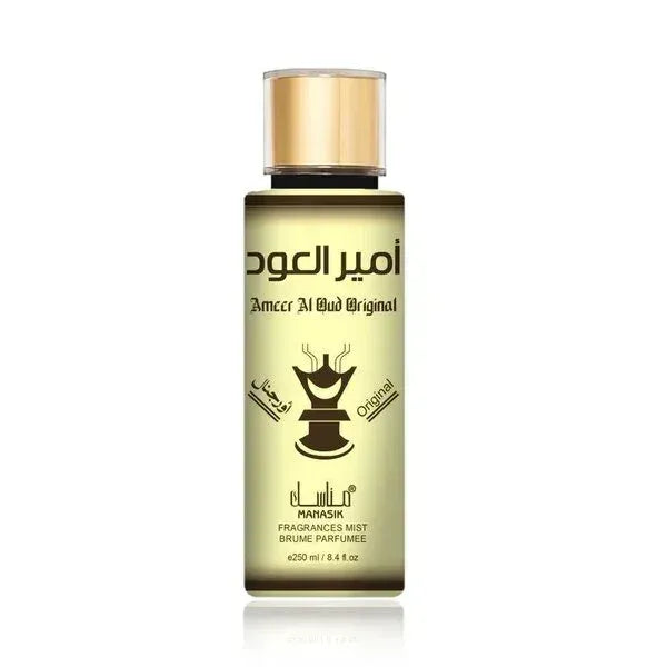 Amberkleurige glazen fles met gouden dop en zwarte arabische tekst marasik voor amr al oud originele geurmist