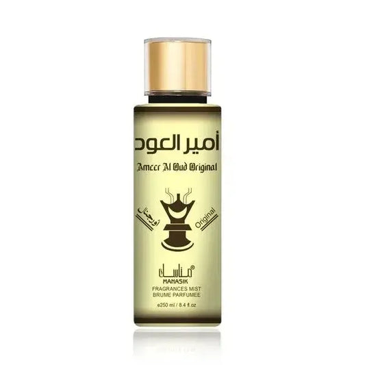Amberkleurige glazen fles met gouden dop en zwarte arabische tekst marasik voor amr al oud originele geurmist