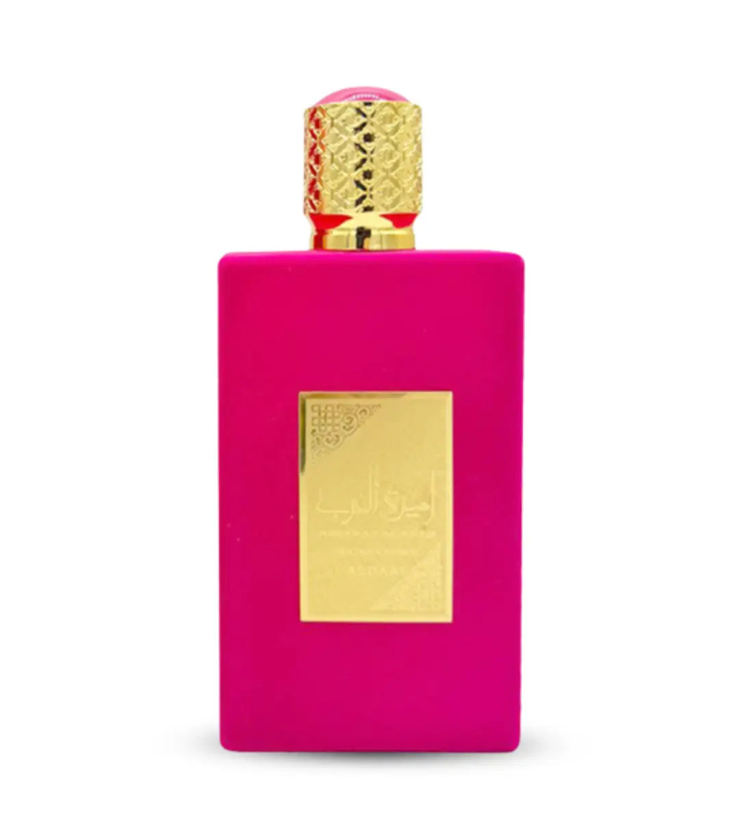 Vibrante fuchsia rechthoekige parfumfles ameerat al arab sugar crown edp met gouden label en gouden dop met roze edelsteen