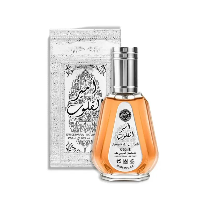 Ornate Ard al Zaafaran Parfum Ameer al Quloob bottle with silver and white design