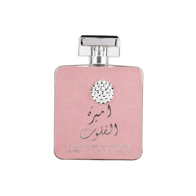Roze vierkante parfumfles ardk al zaafaran ameerat al quloob met zilveren dop en sierlijke ronde versiering aan de voorkant
