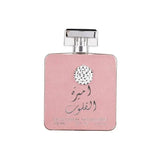 Roze vierkante parfumfles ardk al zaafaran ameerat al quloob met zilveren dop en sierlijke ronde versiering aan de voorkant