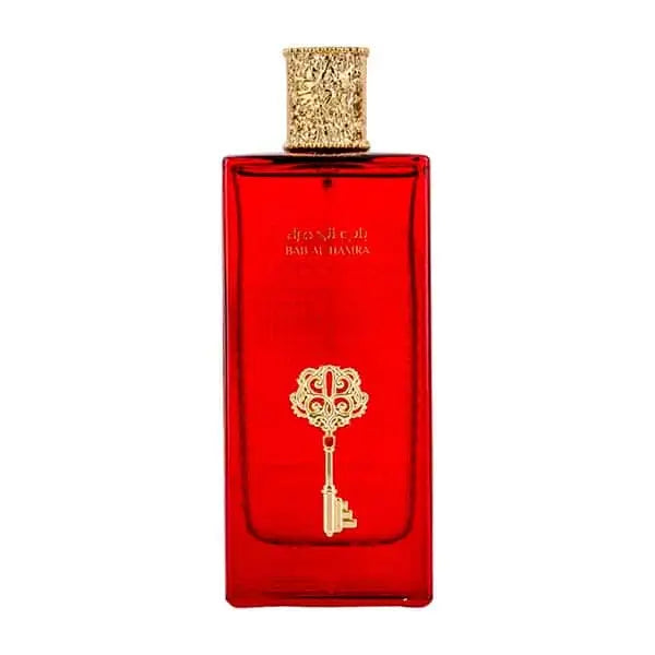 Een levendige rode rechthoekige parfumbottle met een goudkleurig sleuteldesign en een rijke gouden dop van ard al zaafaran bab al hamra