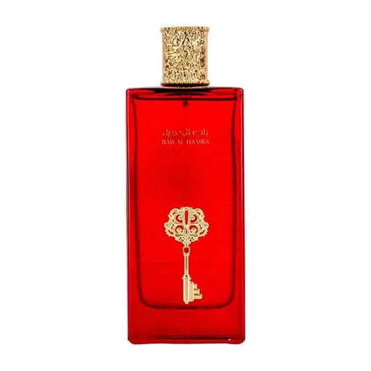 Een levendige rode rechthoekige parfumbottle met een goudkleurig sleuteldesign en een rijke gouden dop van ard al zaafaran bab al hamra