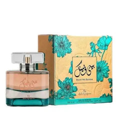 De ard al zaafaran baini wa bainak parfumfles heeft een helder glazen lichaam met een peach naar teal verloop en een zilveren dop