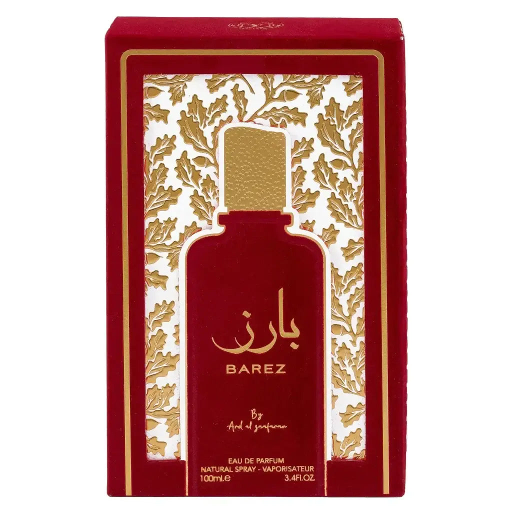 Rode rechthoekige doos met goudbladpatroon en uitsnede die fles barez van ard al ghanam toont in ard al zaafaran collectie