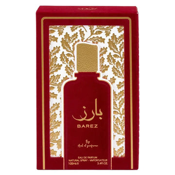 Rode rechthoekige doos met goudbladpatroon en uitsnede die fles barez van ard al ghanam toont in ard al zaafaran collectie