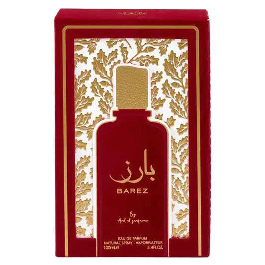 Rode rechthoekige doos met goudbladpatroon en uitsnede die fles barez van ard al ghanam toont in ard al zaafaran collectie