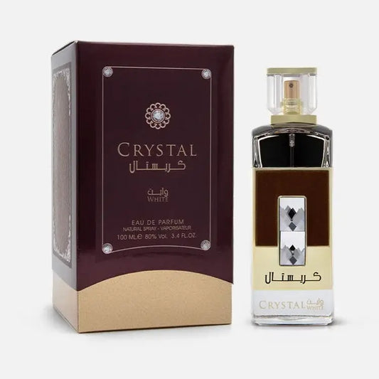 Ard al zaafaran crystal white parfum in een slanke, rechthoekige glazen fles met goudbruine accenten