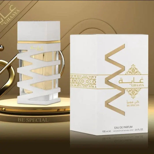 White and gold ard al zaafaran ghaaya be special eau de parfum bottle with sleek geometric design and interlocking white bands