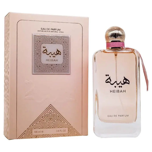 Een slanke, rechthoekige glazen fles heibah eau de parfum van ard al zaafaran met goudkleurige dop en roze lint