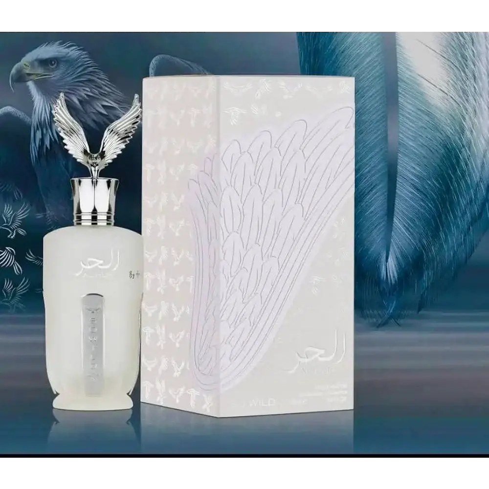 Elegante witte parfumfles ard al zaafaran al hur so wild met zilveren arendvormige dop en arabische schrijfkunst